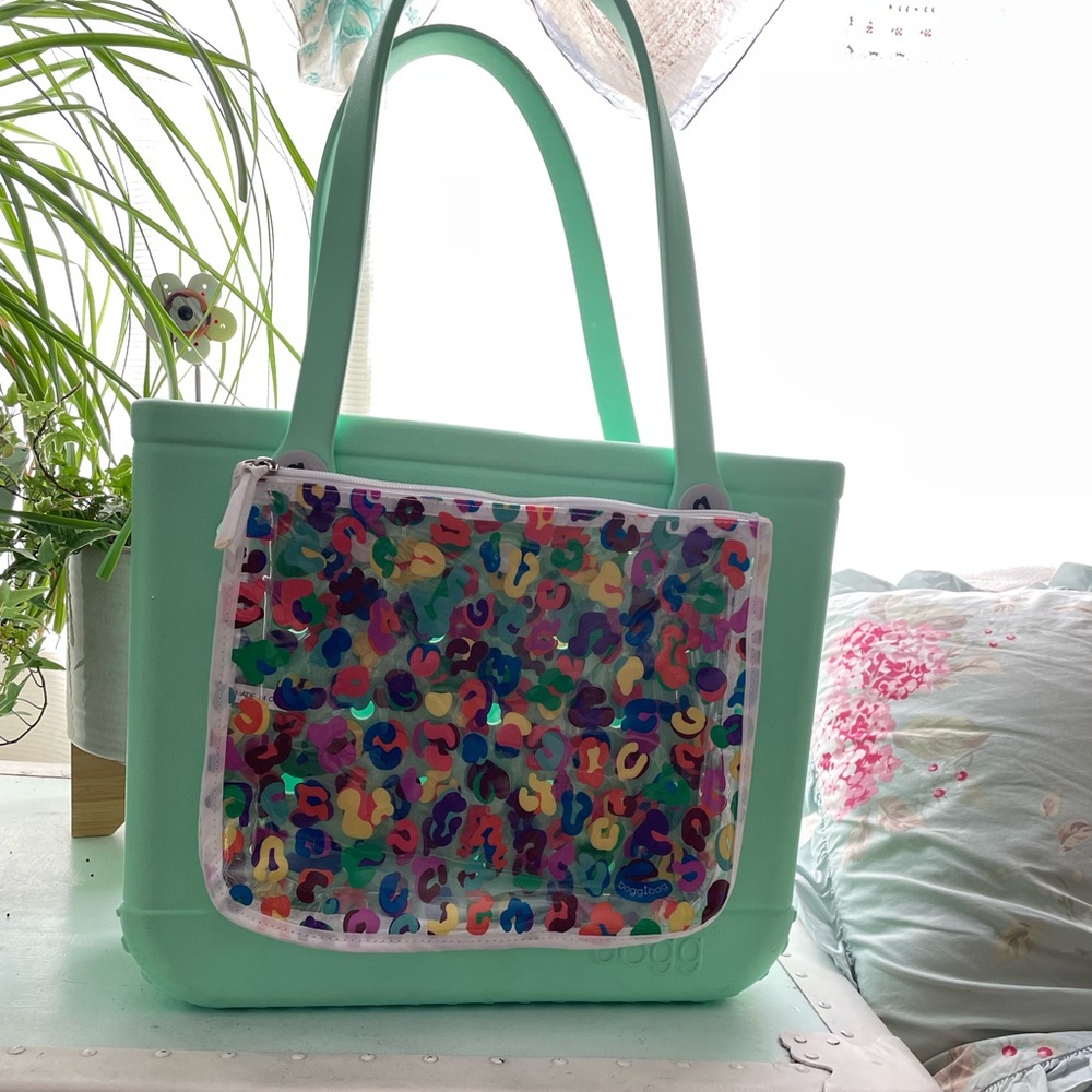 Mint green medium bogg bag with removable pouches.